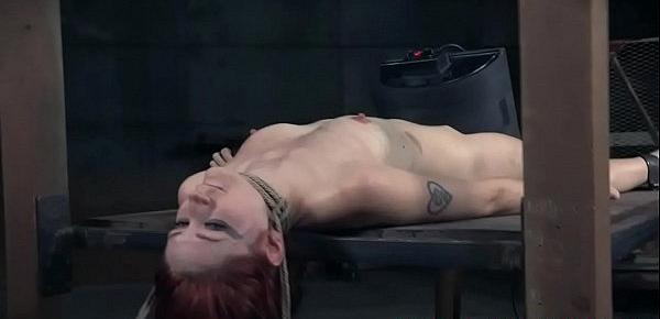  Suspended redhead clit punished with electro